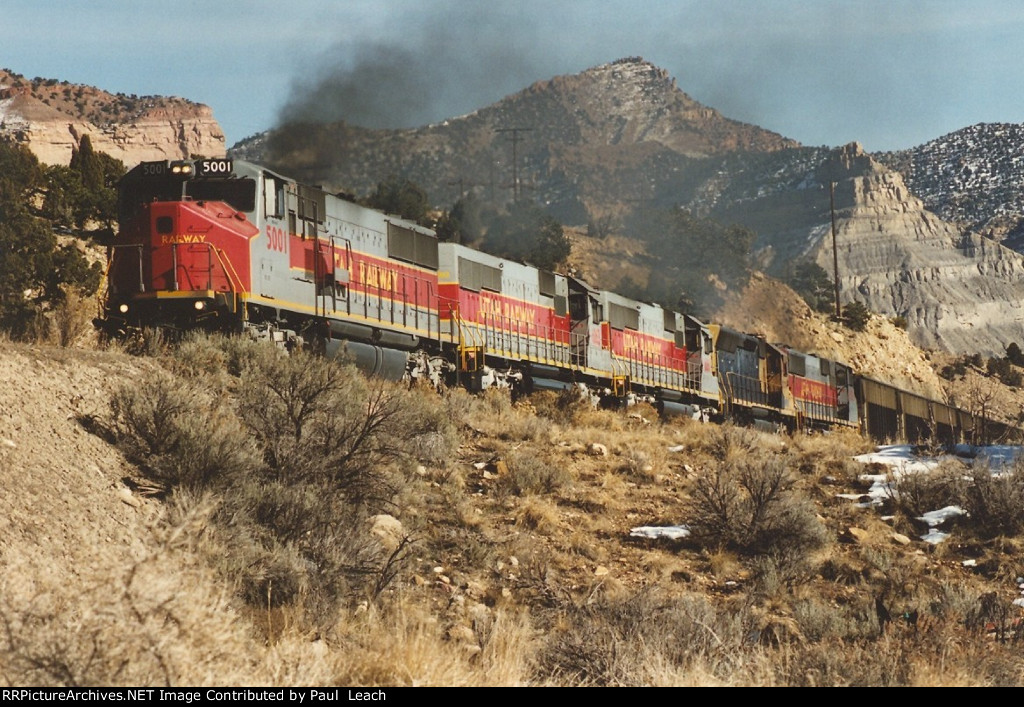 Empty coal train rolls west